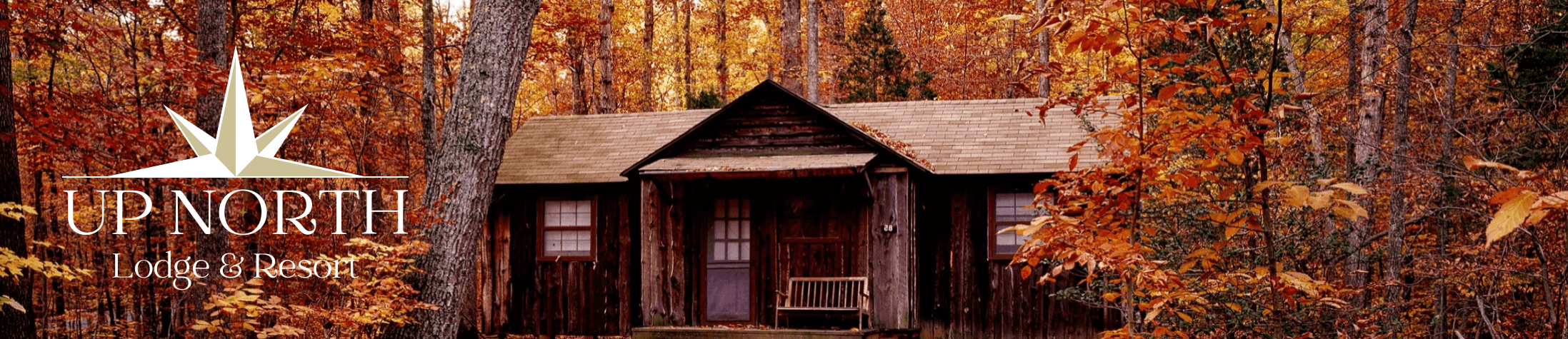 Cozy seating area in log cabin; Photo by Pixabay